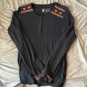 Black Outback long sleeve with some aztec designs. Super cute breathable shirt!